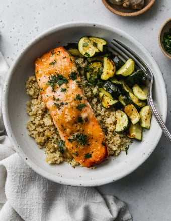Overhead photo of a bowl of miso ginger salmon, quinoa, and zucchini.