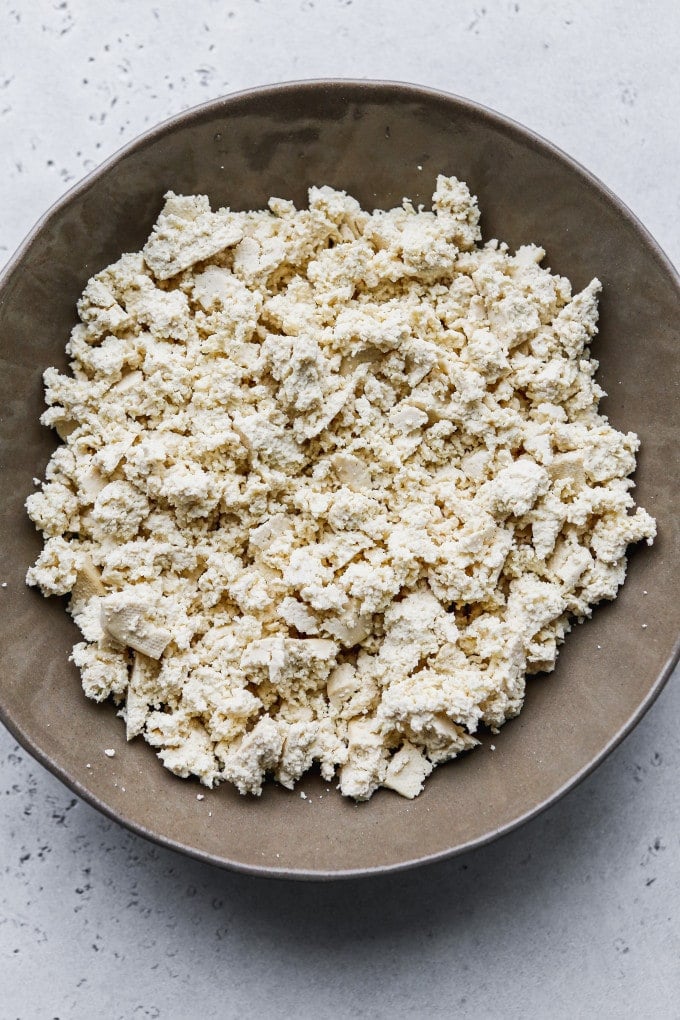 Overhead photo of crumbled tofu in a bowl.
