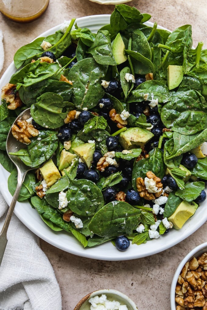 Spinach blueberry salad tossed in balsamic dressing.