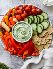 Cottage cheese dip served on a vegetable platter.