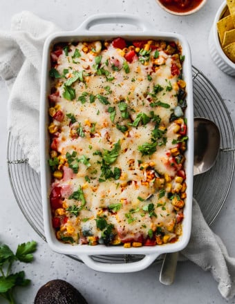 Vegetarian Mexican rice casserole in a white baking dish.