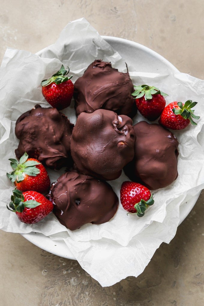 Chocolate covered strawberry yogurt clusters in a bowl.