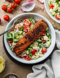 Salmon couscous salad in a bowl.