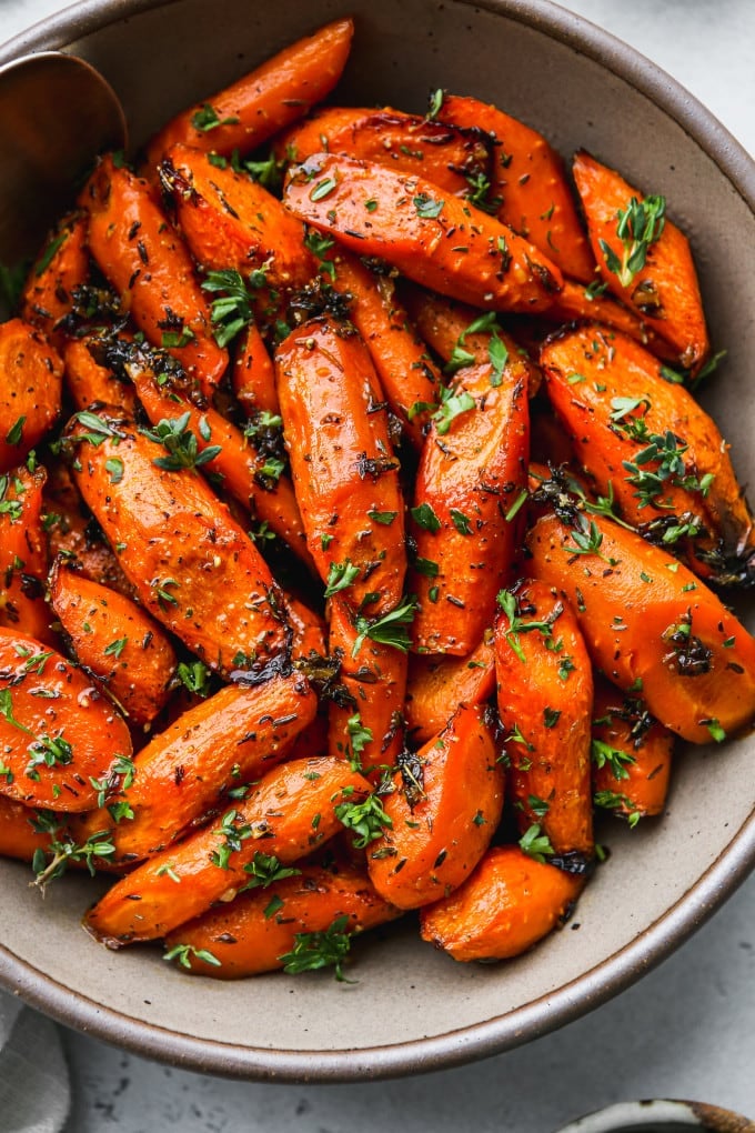 Honey roasted carrots in a serving bowl.