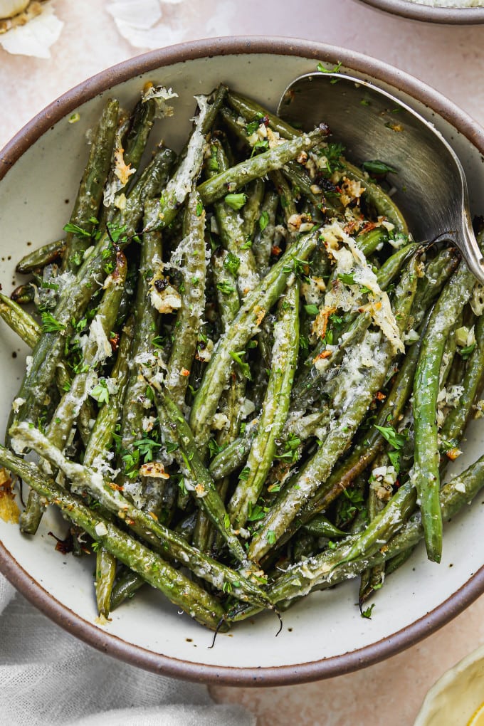 Roasted green beans served in a bowl.