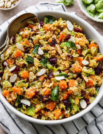 Quinoa pilaf with vegetables in a serving bowl.
